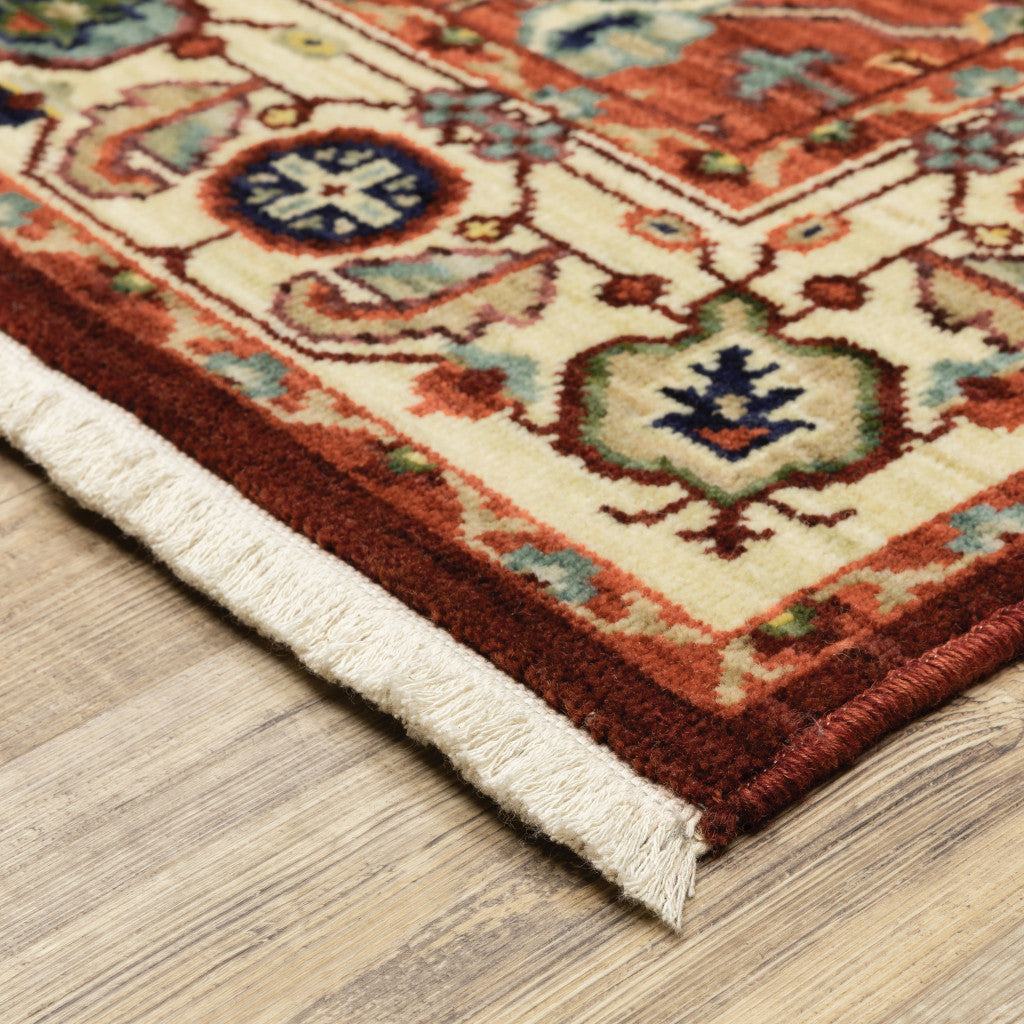 10' X 13' Red Ivory Orange And Blue Oriental Power Loom Stain Resistant Area Rug With Fringe