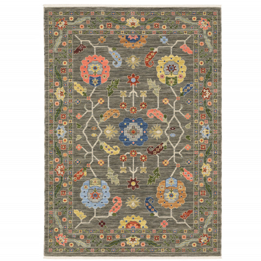 10' X 13' Grey Blue Pink Orange Rust Red Green And Ivory Oriental Power Loom Stain Resistant Area Rug With Fringe