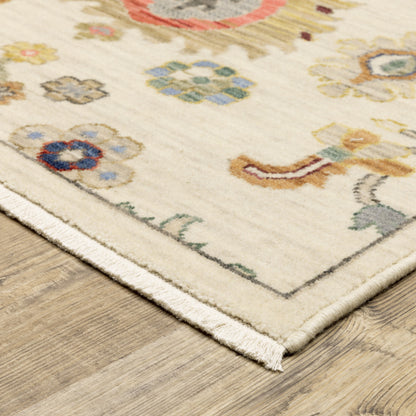 10' X 13' Ivory Beige Gold Grey Blue Pink Red Rust And Green Oriental Power Loom Stain Resistant Area Rug With Fringe