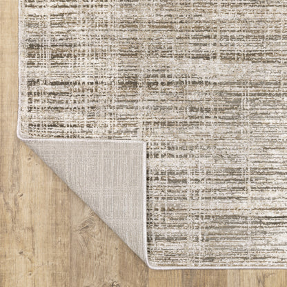 10' X 13' Beige Grey Ivory Tan And Brown Abstract Power Loom Stain Resistant Area Rug