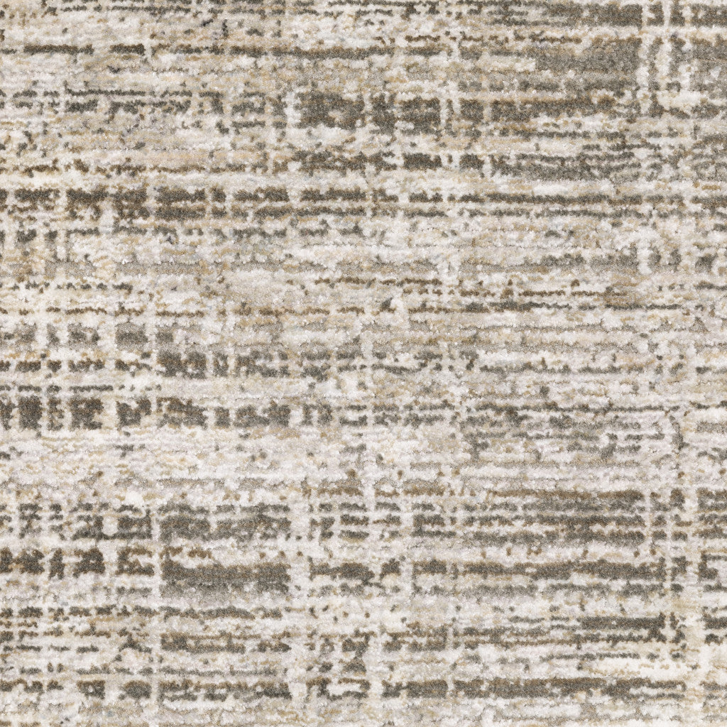 10' X 13' Beige Grey Ivory Tan And Brown Abstract Power Loom Stain Resistant Area Rug