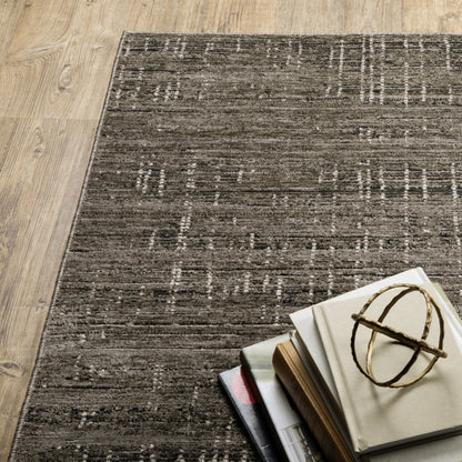 10' X 13' Charcoal Grey Grey Ivory Tan And Brown Abstract Power Loom Stain Resistant Area Rug