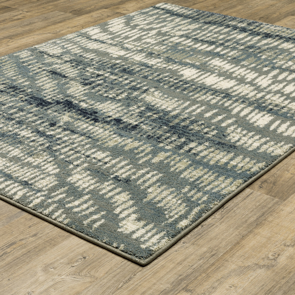 10' X 13' Grey Beige Blue And Light Blue Abstract Power Loom Stain Resistant Area Rug