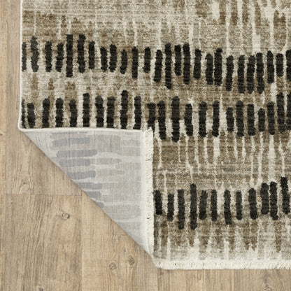 10' X 13' Beige Ivory Charcoal Brown Tan And Grey Abstract Power Loom Stain Resistant Area Rug With Fringe