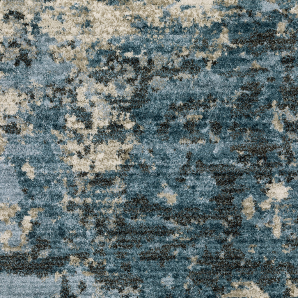 10' X 13' Blue Grey Ivory Light Blue And Dark Blue Abstract Power Loom Stain Resistant Area Rug With Fringe