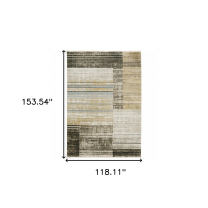 10' X 13' Beige Charcoal Brown Grey Tan Gold And Blue Geometric Power Loom Stain Resistant Area Rug With Fringe