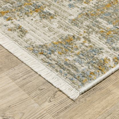 10' X 13' Beige Grey Gold Blue Rust And Teal Abstract Power Loom Stain Resistant Area Rug With Fringe