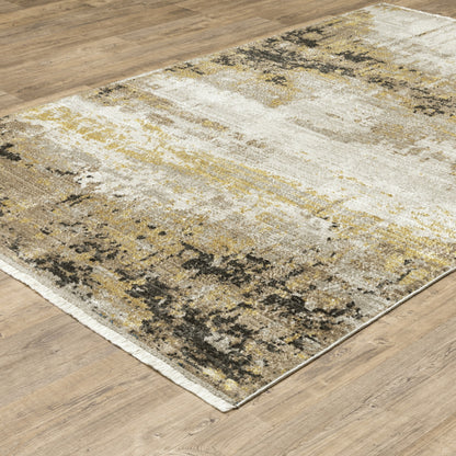 10' X 13' Grey Gold Black Charcoal And Beige Abstract Power Loom Stain Resistant Area Rug With Fringe