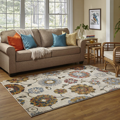 10' X 13' Ivory Blue Gold Green Orange Rust And Teal Floral Power Loom Stain Resistant Area Rug