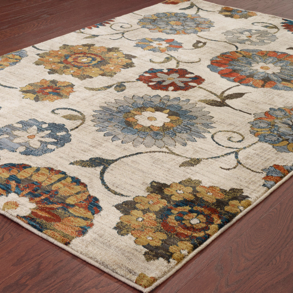 10' X 13' Ivory Blue Gold Green Orange Rust And Teal Floral Power Loom Stain Resistant Area Rug