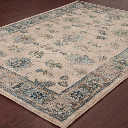 10' X 13' Ivory Blue Gold And Grey Oriental Power Loom Stain Resistant Area Rug