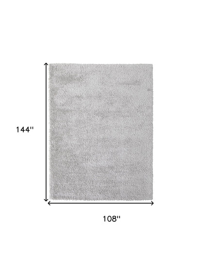 5' X 8' Ivory Shag Power Loom Stain Resistant Area Rug