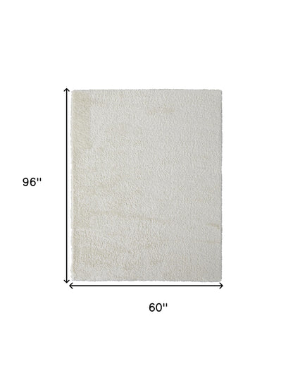 5' X 8' Ivory Shag Power Loom Stain Resistant Area Rug
