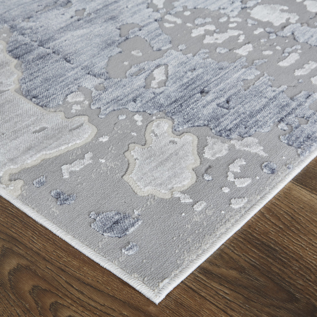 10' X 13' Ivory And Blue Abstract Power Loom Distressed Area Rug