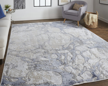 10' X 13' Ivory And Blue Abstract Power Loom Distressed Area Rug