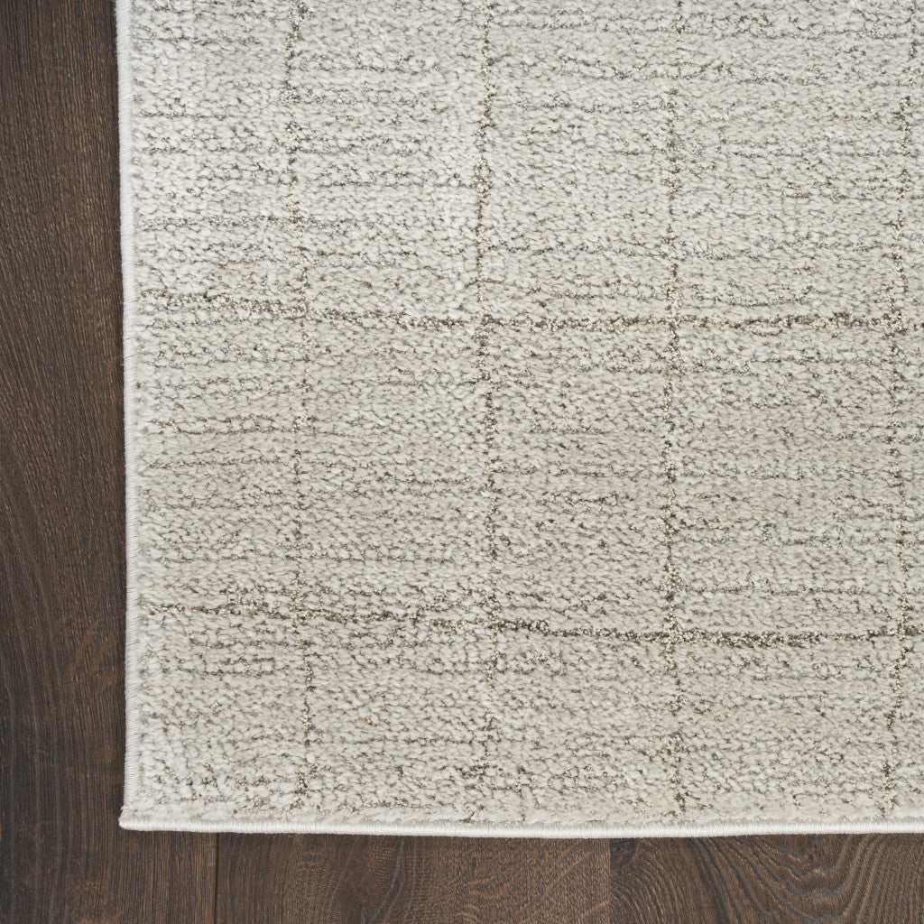 8' X 10' Beige and Ivory Abstract Power Loom Area Rug