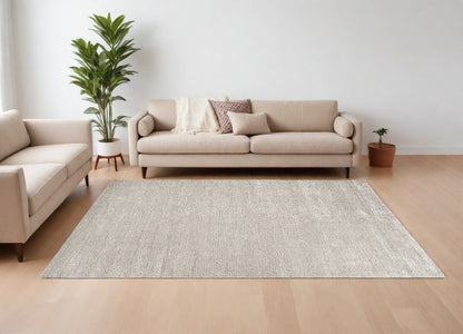 8' X 10' Beige and Ivory Abstract Power Loom Area Rug