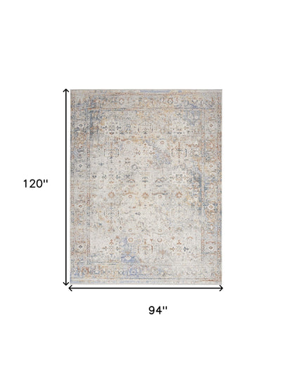 8' X 10' Ivory Blue and Orange Oriental Power Loom Distressed Area Rug With Fringe