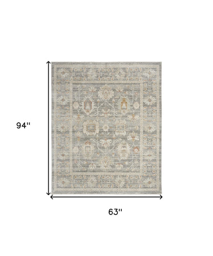 5' X 8' Beige Ivory and Gray Oriental Power Loom Distressed Area Rug With Fringe