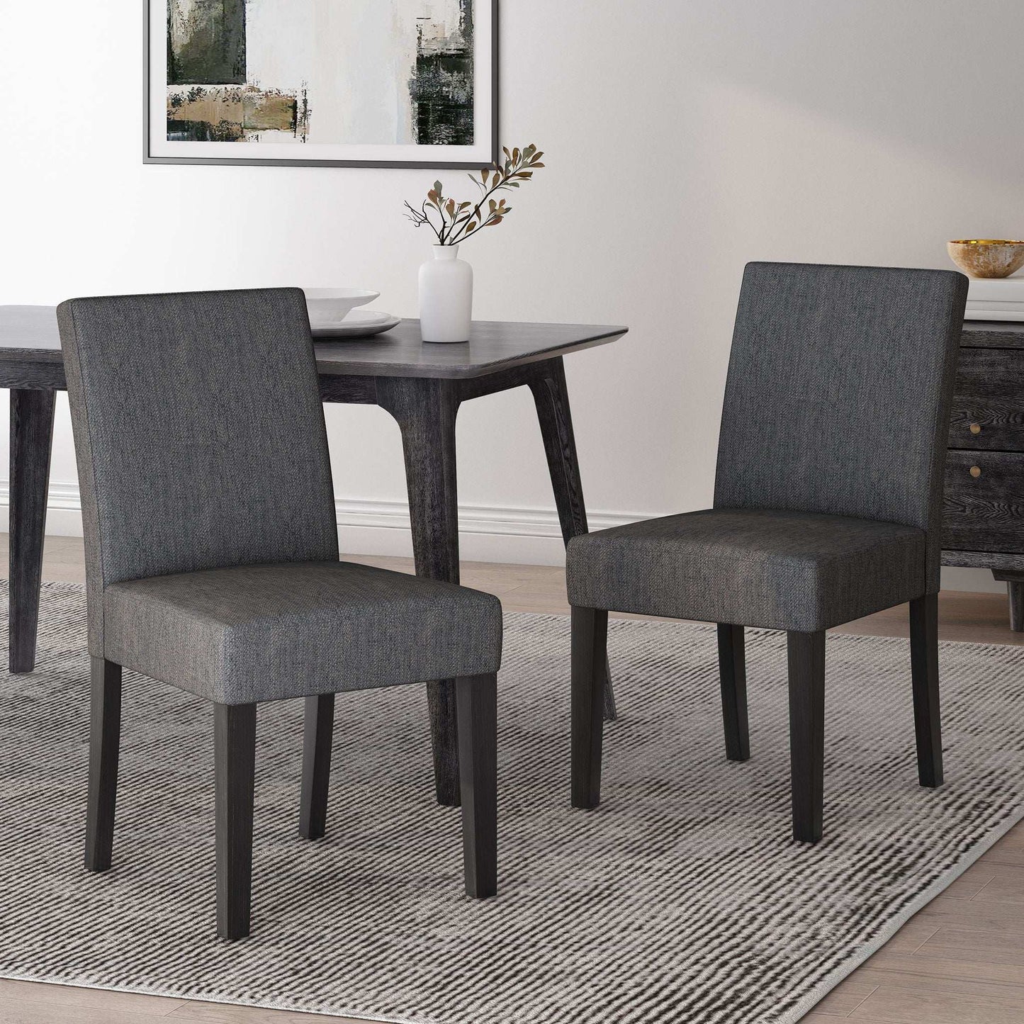 Contemporary Dining Chair With Upholstered Seating And Tapered Legs