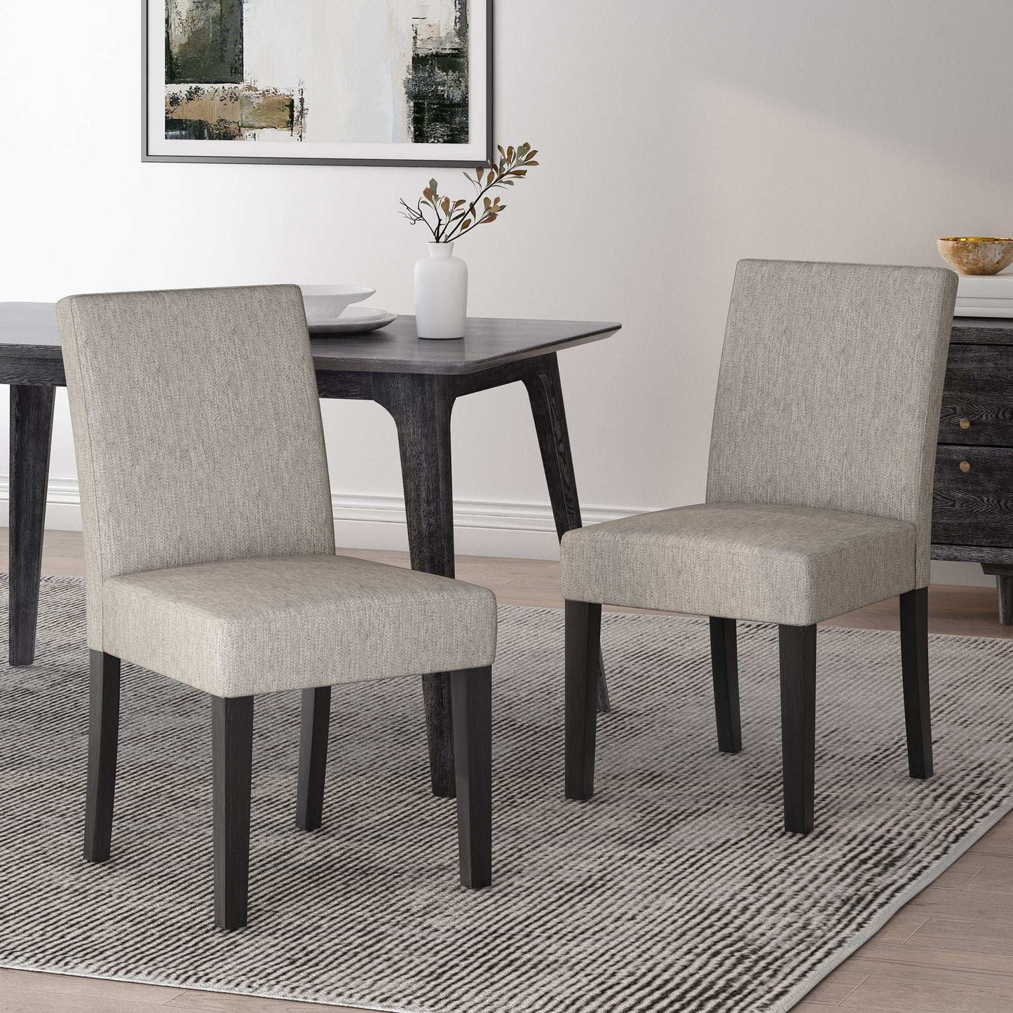 Contemporary Dining Chair With Upholstered Seating And Tapered Legs